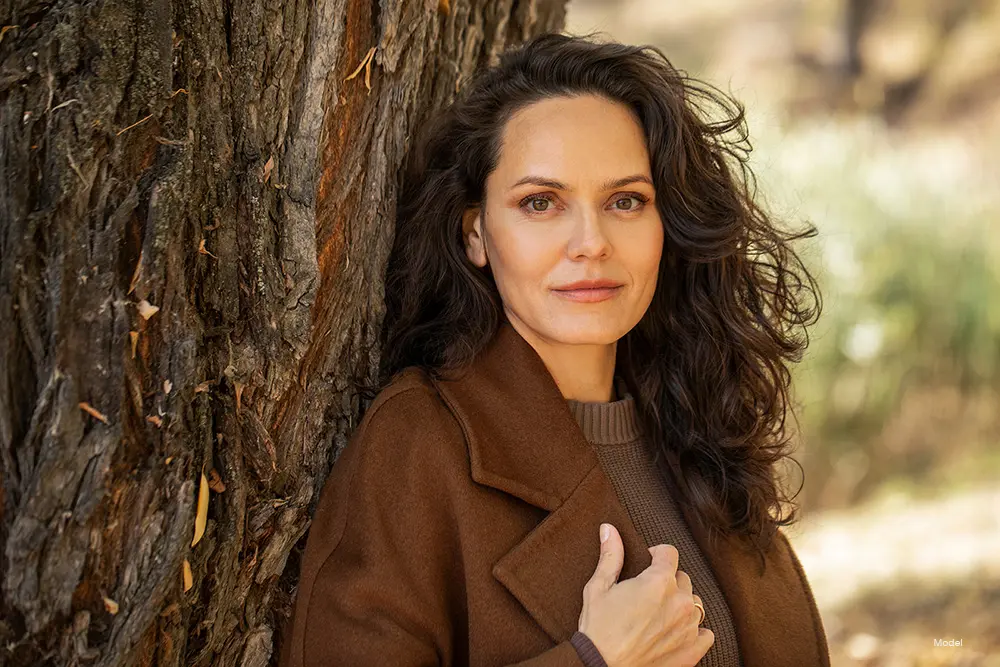 Woman in a brown coat
