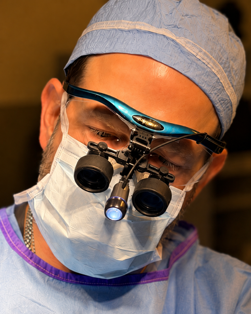 Dr. Weinfeld in surgical loupes