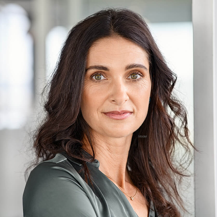 Mature woman with green eyes